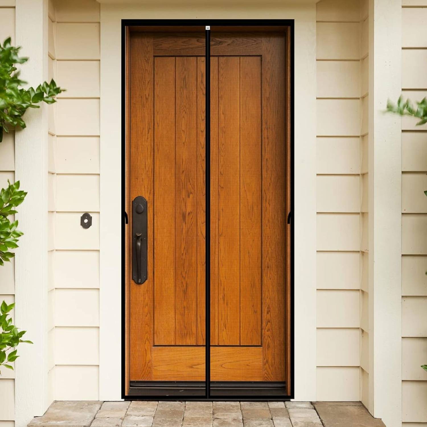 A black magnetic fly screen door fitted to an open doorway